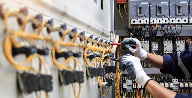 Professional Electrician technician working in Harvest, AL